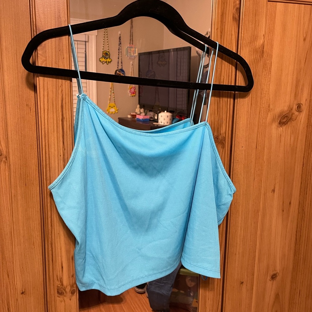 Light blue asymmetrical tank